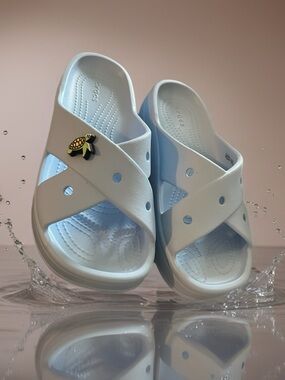 CROCS Women's Pale Blue Crisscross Slide Sandals with Turtle Charm/Jibtz